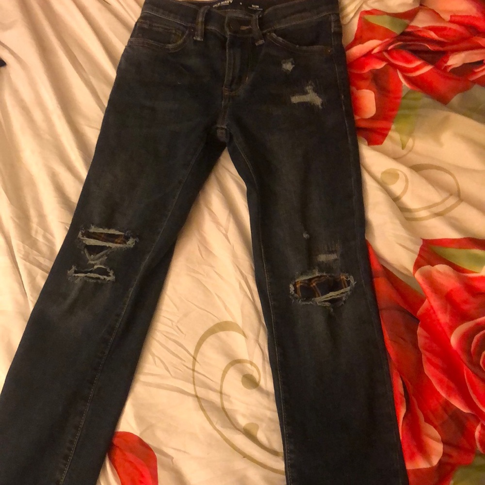 I am selling a pair of dark blue low rise jeans.